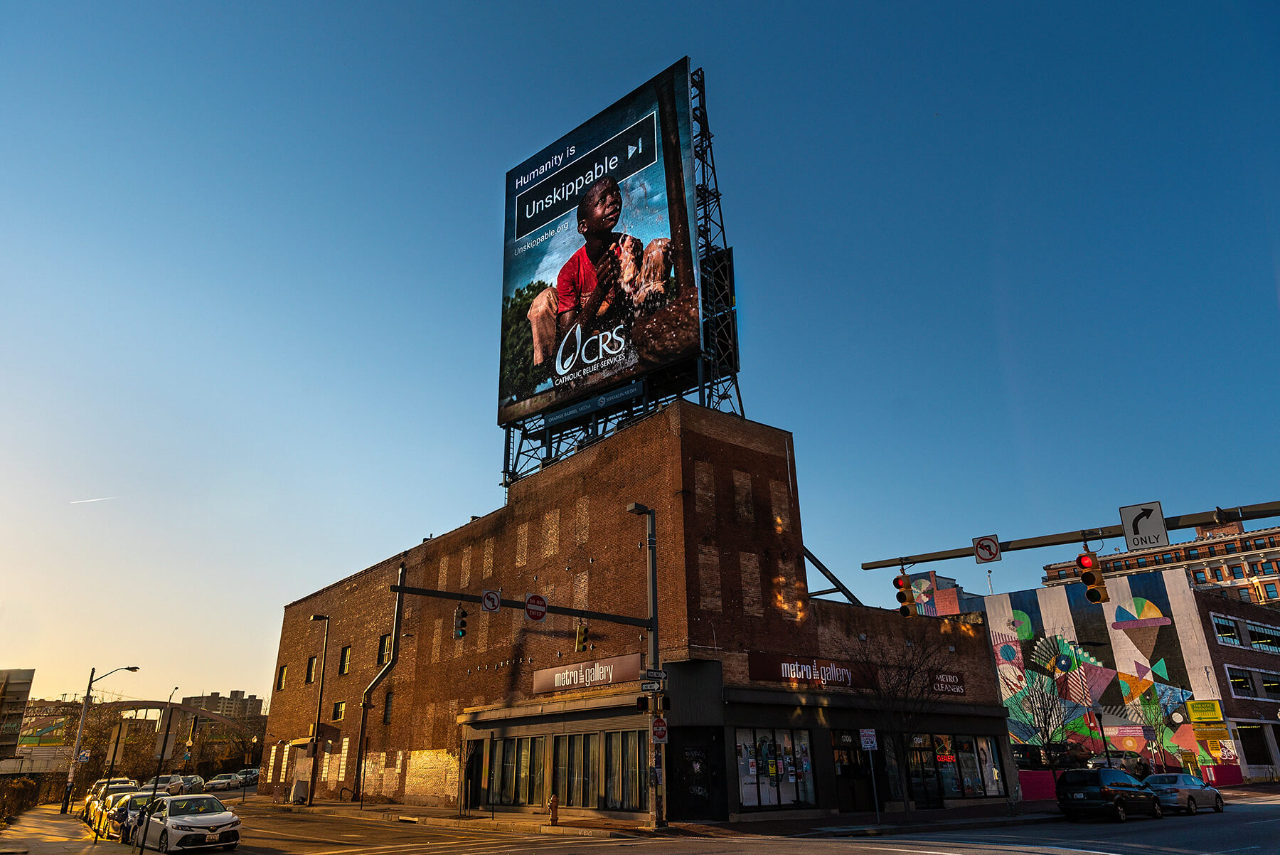 catholic relief services unskippable billboard in baltimore, part of the unskippable marketing campaign